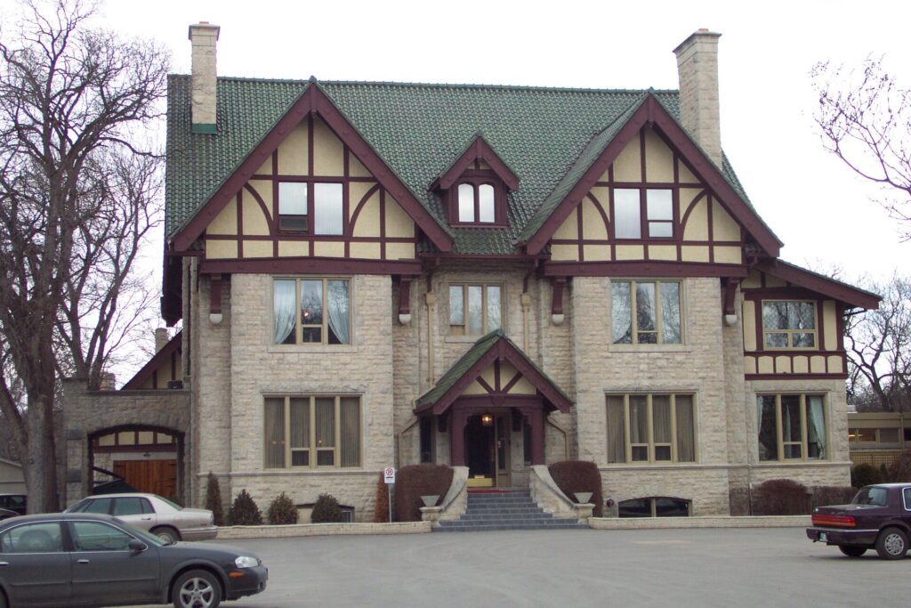 A stone and half-timbered character home on Wellington Crescent in Winnipeg's River Heights area